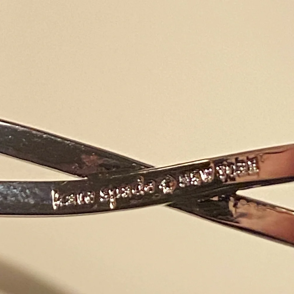 Kate spade cubic zirconia pave silver plated Infinite hinges bangle, new.